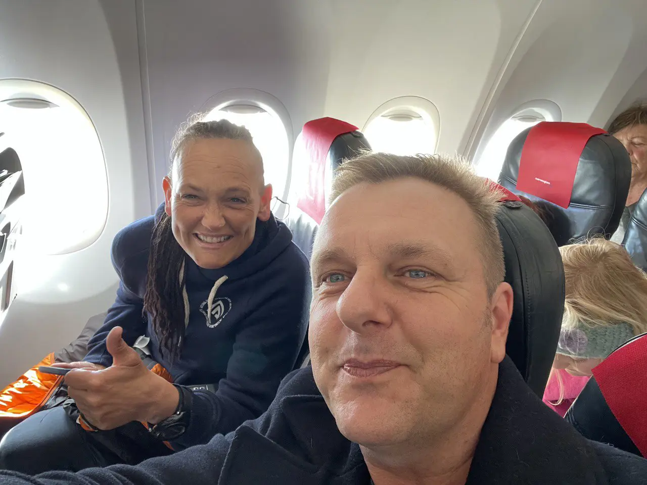 Me listening to Vibeke's stories on an airplane